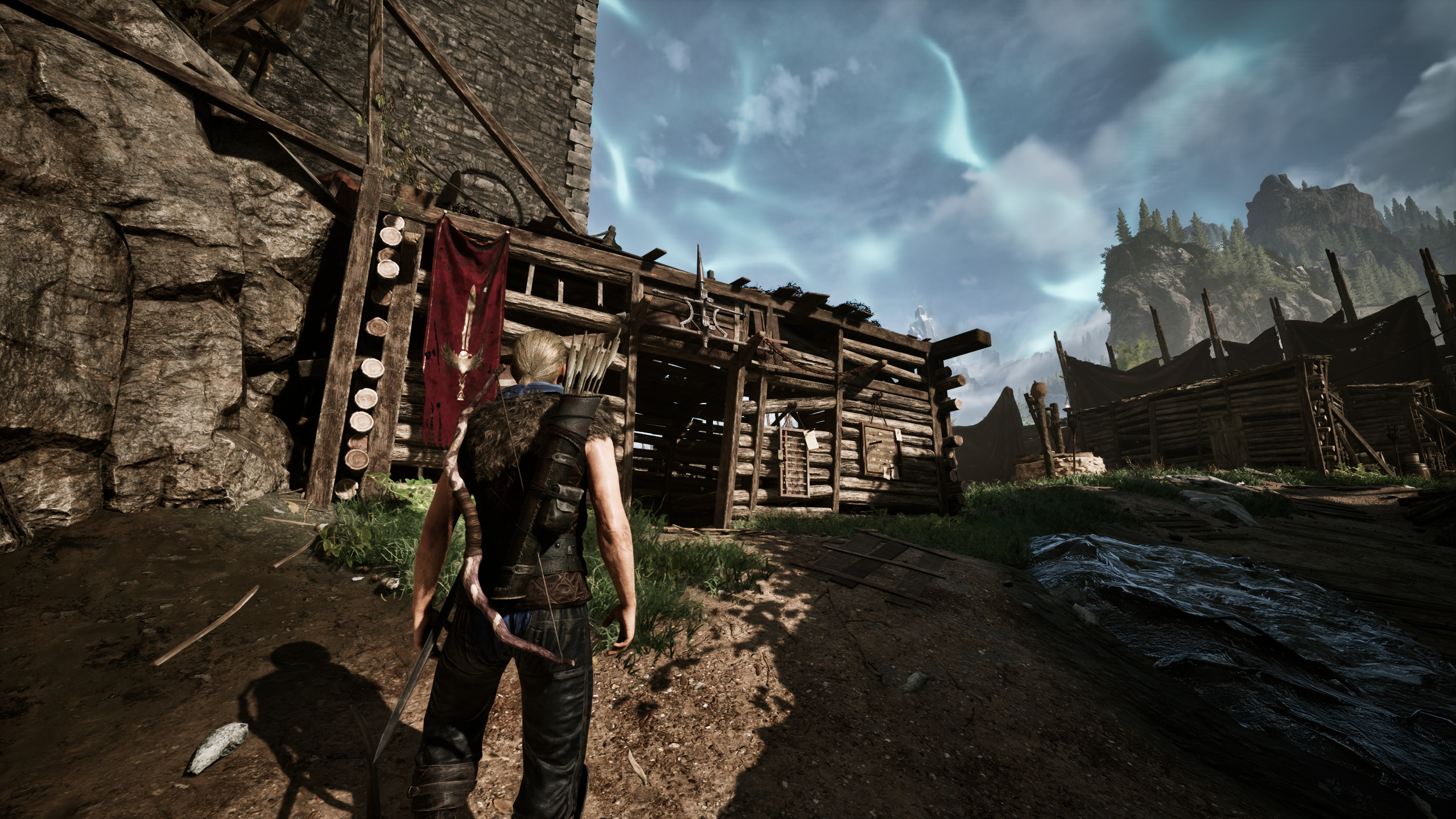 Gothic 1 Remake, сундук Скатти: игрок стоит снаружи хижины Скатти у стен замка в Старом лагере, днём, лицом к зданию.
