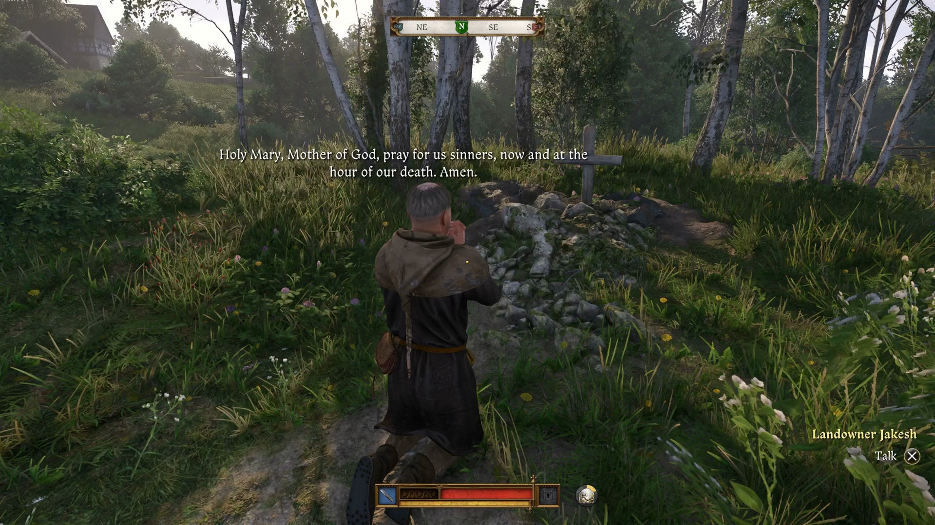 Якеш молится у могилы сына во время квеста «Дурная кровь» в Kingdom Come Deliverance 2.