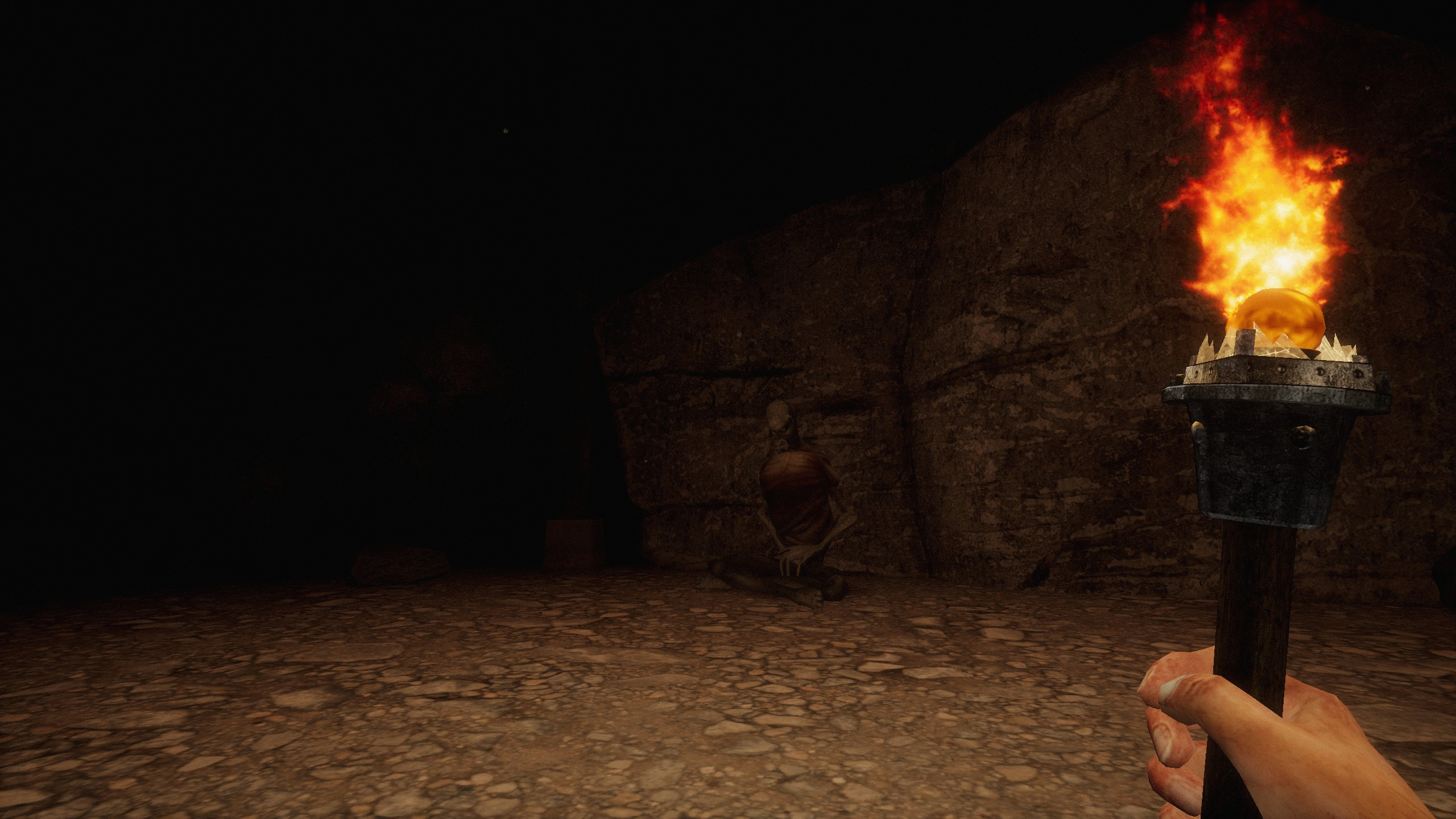 в тёмной пещере с факелом: взгляд на мёртвое сидящее тело