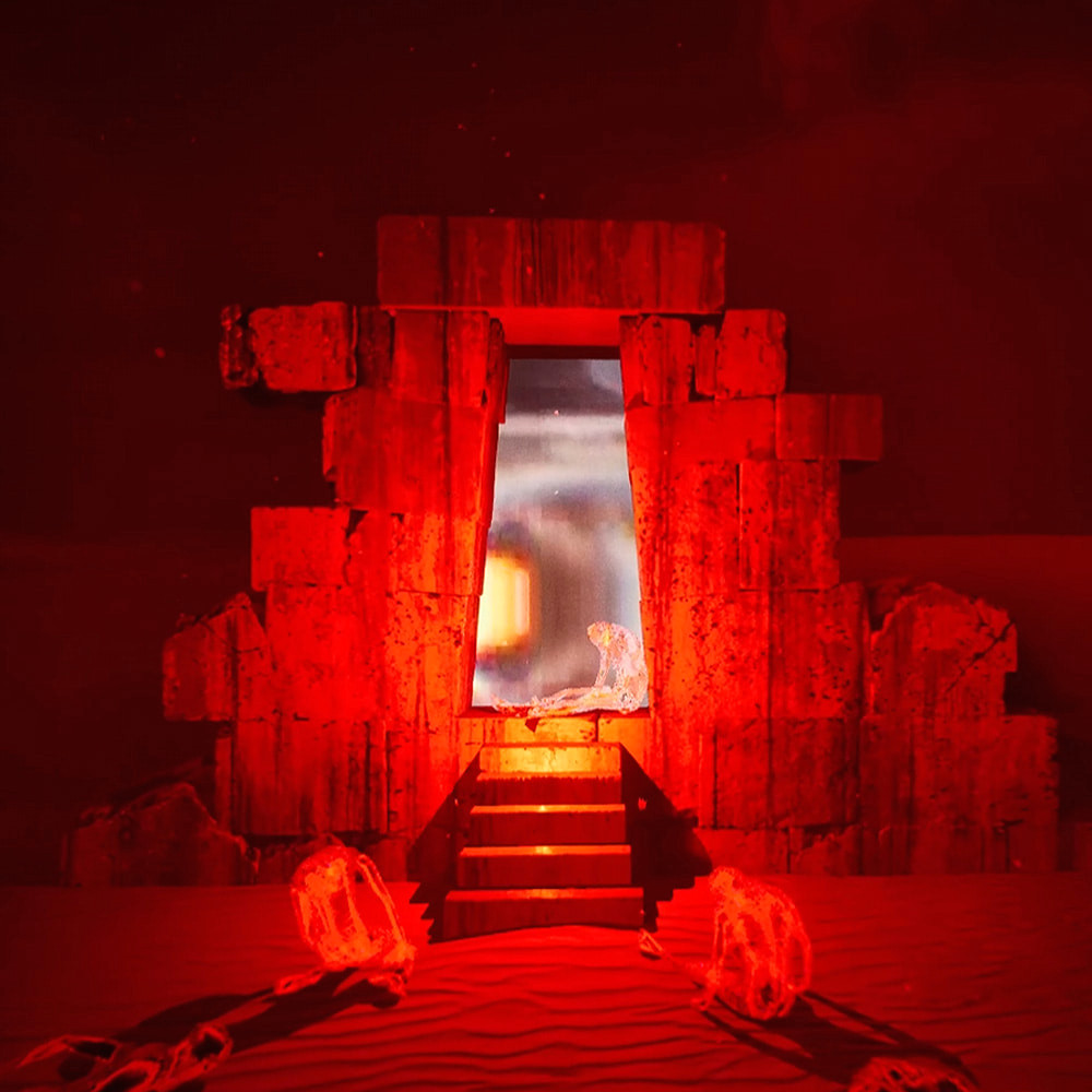 Жуткая каменная конструкция в Sleep Awake посреди бескрайней песчаной пустыни. Снаружи валяются похожие на призраков тела, всё залито зловещим красным светом.