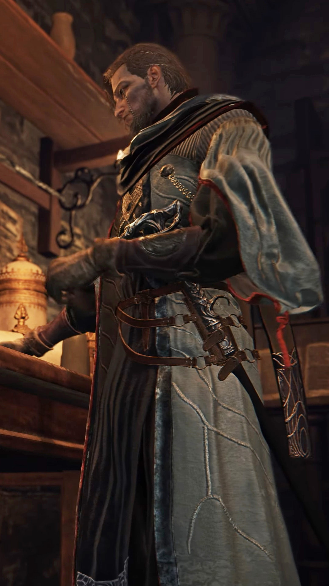 Учёный из Elden Ring Nightreign The Forsake Hollows склоняется над своей книгой